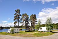 Vorschaubild: Kolgårdens Stugby & Camping in Lövliden bei Vilhelmina kleine Stellplatzwiese